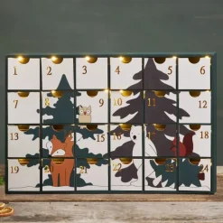 Adventskalenderhus i trä