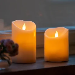 Blockljus med glimmande låga