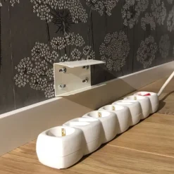 Grenuttagshållare