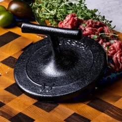 Hamburgerpress i gjutjärn, Lursta
