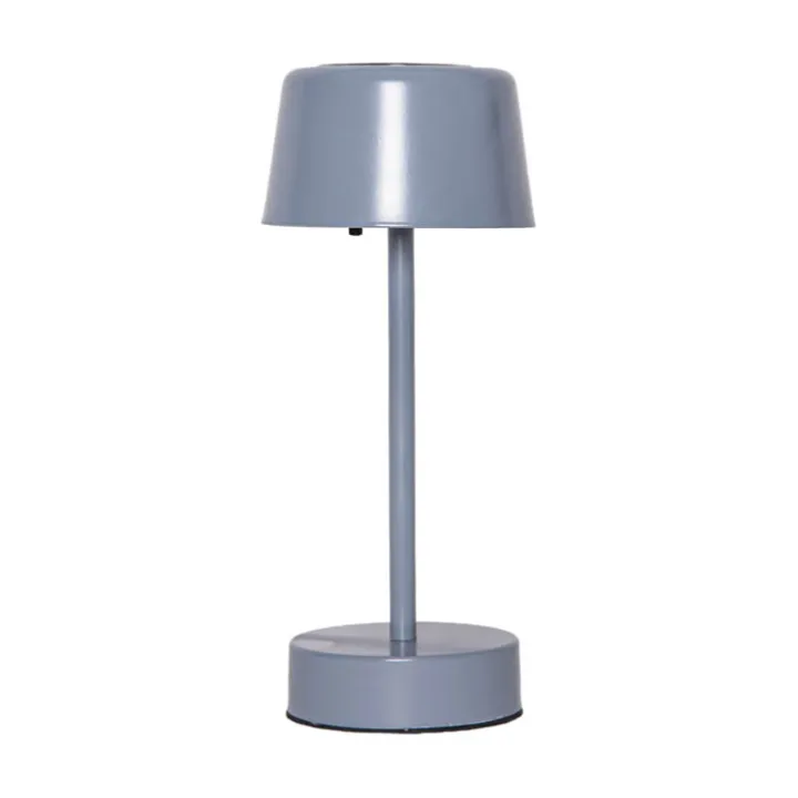 Liten solcellsladdad bordslampa